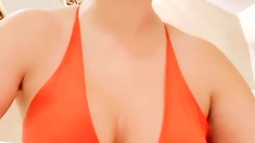 Busty curly brunette with big boobs fucks on couch