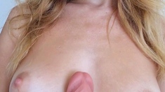 An amateur hitchhiking blonde is toying with drivers cock