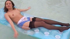 Sexy brunette wearing stockings masturbates webcam