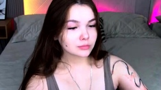 Beautiful teen brunette Jessica Sinn masturbates