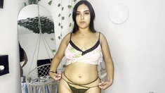 Babe strips off panties and masturbates solo
