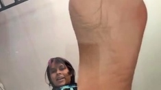 Busty brunette foot fetish and footjob in nylons