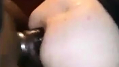 Girl taking huge black knob